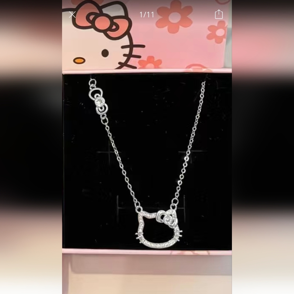 Adorable Silver Hello Kitty pendant necklace with 🎀
